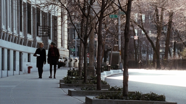 Wide shot frame from You've Got Mail — walking, street, fire