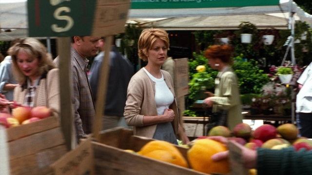 Wide shot frame from You've Got Mail — people, action, standing
