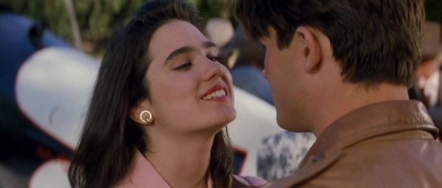 Wide shot frame from The Rocketeer — standing, hair, person