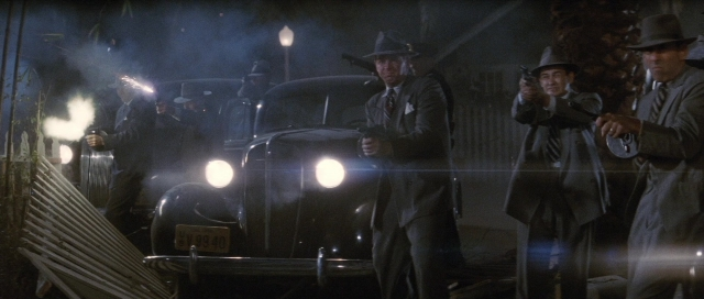 Wide shot frame from The Rocketeer — standing, plate, street
