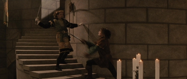 Wide shot frame from The Rocketeer — standing, fight, person