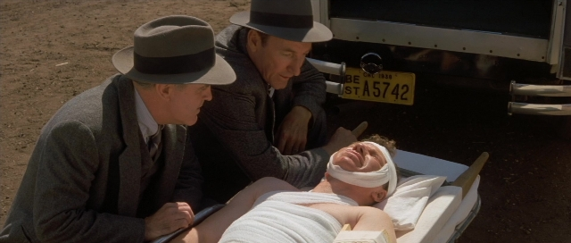 Frame from The Rocketeer — plate, hat, person