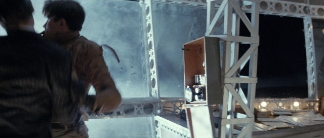 Frame from The Rocketeer — standing, room, hand