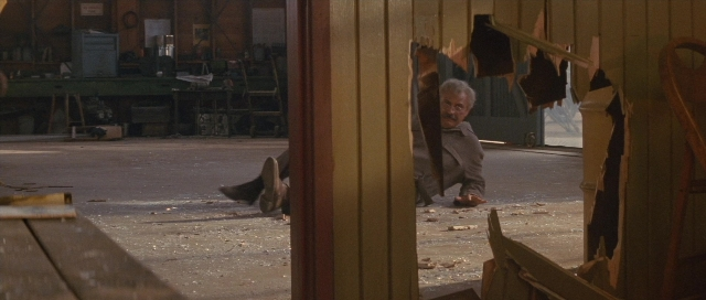 Wide shot frame from The Rocketeer — sitting, face, person