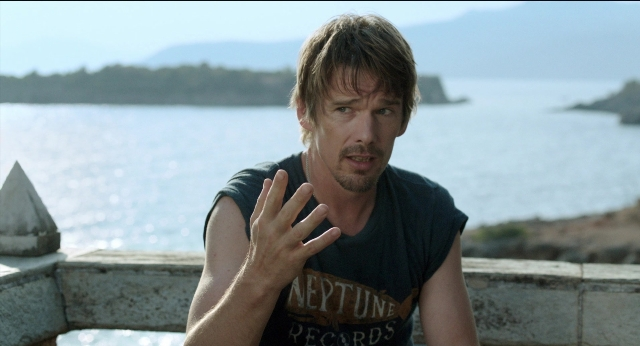 Wide shot frame from Before Midnight — standing, hand, shirt