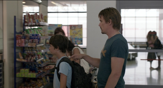 Wide shot frame from Before Midnight — standing, shirt, person