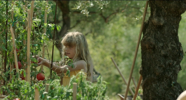 Wide shot frame from Before Midnight — standing, dress, face