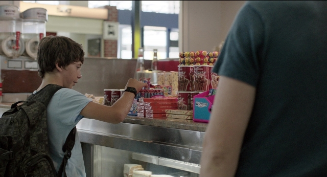 Frame from Before Midnight — standing, kitchen, food