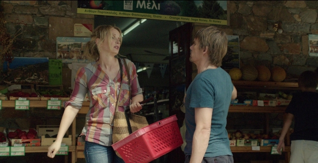 Wide shot frame from Before Midnight — standing, shirt, face