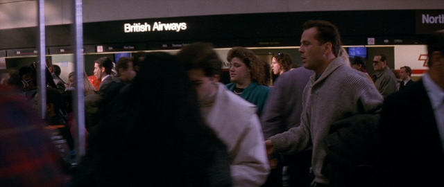 Frame from Die Hard 2 — walking, person, human face