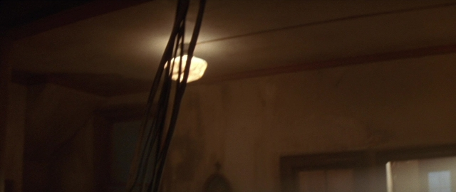 Frame from Die Hard 2 — room, lamp, curtain