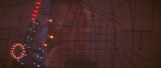 Wide shot frame from Die Hard 2 — night, light bulb