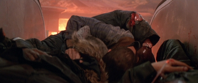 Frame from Die Hard 2 — standing, room, person