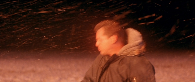 Frame from Die Hard 2 — walking, night, face
