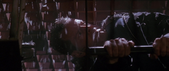 Wide shot frame from Die Hard 2 — face, person, human face