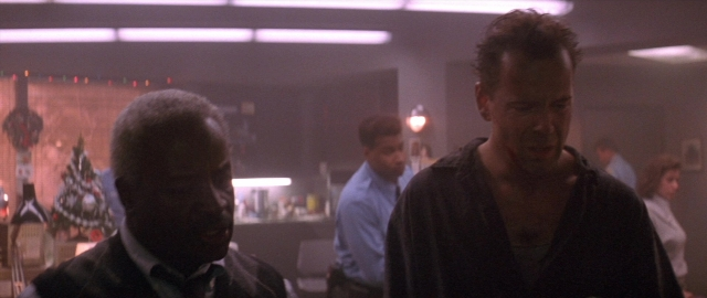 Frame from Die Hard 2 — room, face, hair
