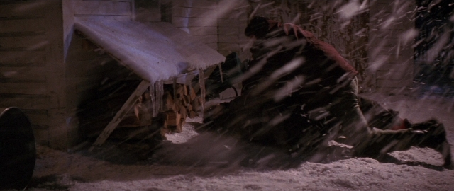 Wide shot frame from Die Hard 2 — hand, snow, person