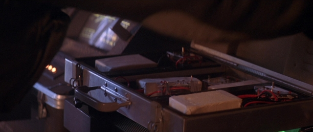 Frame from Die Hard 2 — car, box