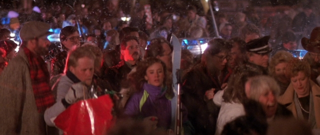 Wide shot frame from Die Hard 2 — street, night, person