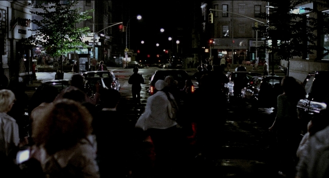Wide shot frame from The King of Comedy — walking, street, night