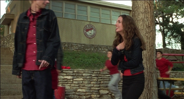 Wide shot frame from The New Guy — standing, walking, dialogue