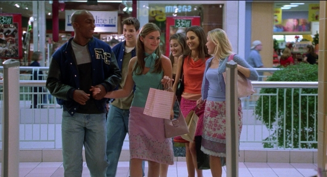 Wide shot frame from The New Guy — standing, walking, dialogue