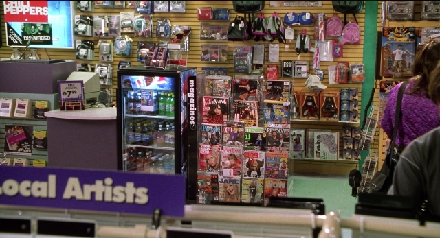 Wide shot frame from The New Guy — standing, face, person