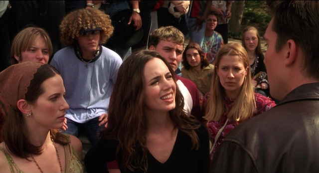 Wide shot frame from The New Guy — standing, dialogue, shirt