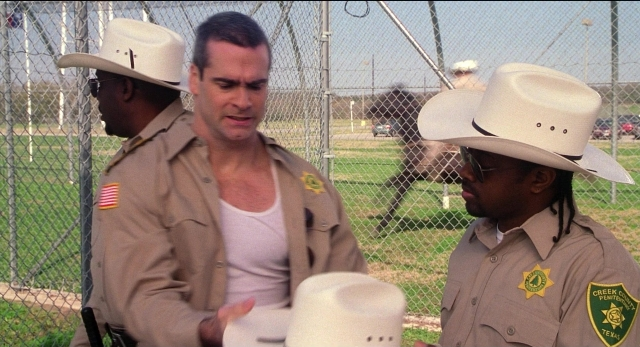Wide shot frame from The New Guy — standing, walking, dialogue