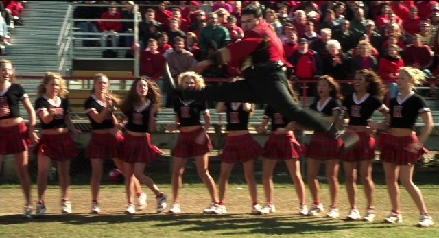 Wide shot frame from The New Guy — shirt, person, footwear