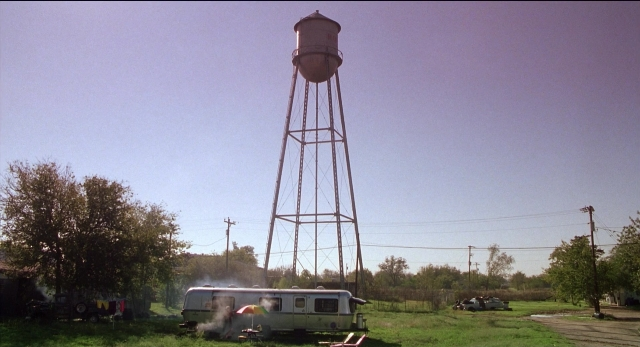 Frame from The New Guy — water, tower, umbrella