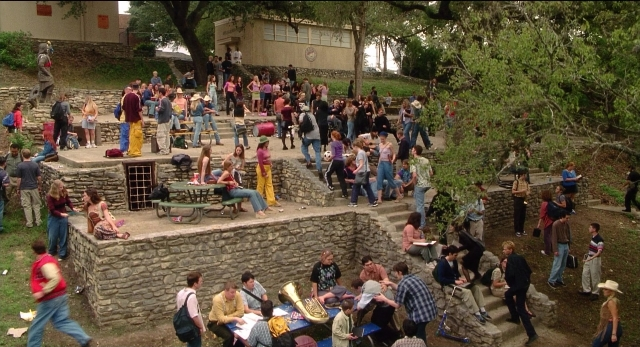Wide shot frame from The New Guy — sitting, standing, walking
