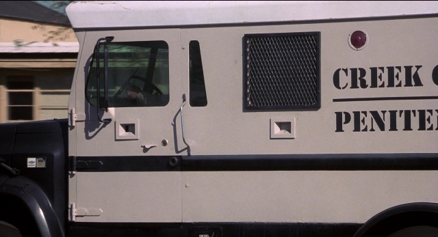 Frame from The New Guy — door, street, car