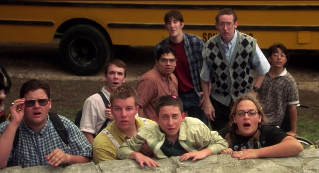 Wide shot frame from The New Guy — standing, shirt, bus