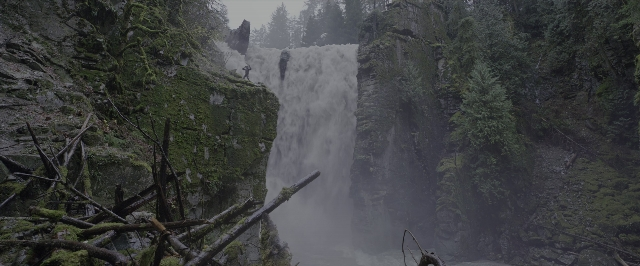 Wide shot frame from War for the Planet of the Apes — standing, water, person