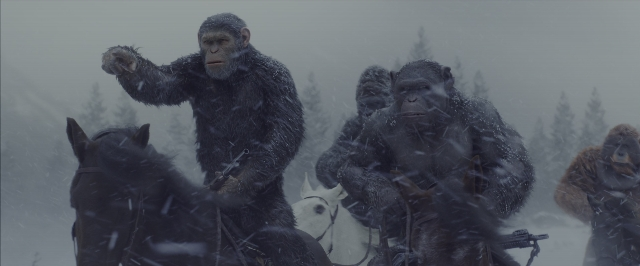 Wide shot frame from War for the Planet of the Apes — standing, animal, gun
