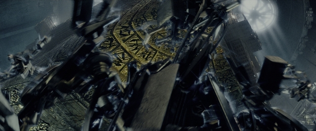 Wide shot frame from Transformers — clock, building