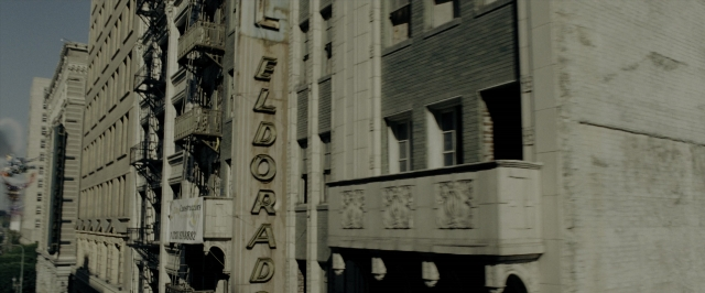 Wide shot frame from Transformers — walking, street, person