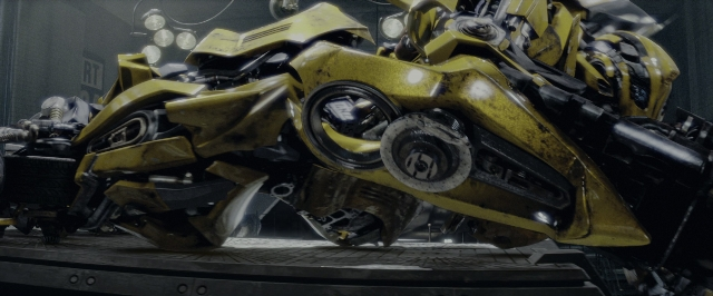 Wide shot frame from Transformers — car, wheel, car tire