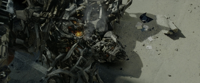 Wide shot frame from Transformers — car tire