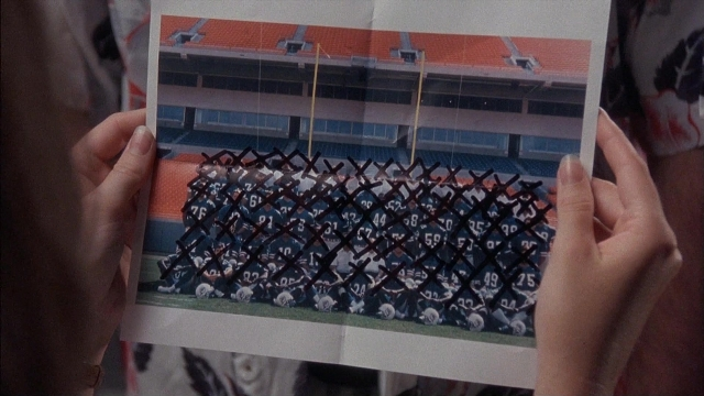 Wide shot frame from Ace Ventura: Pet Detective — person
