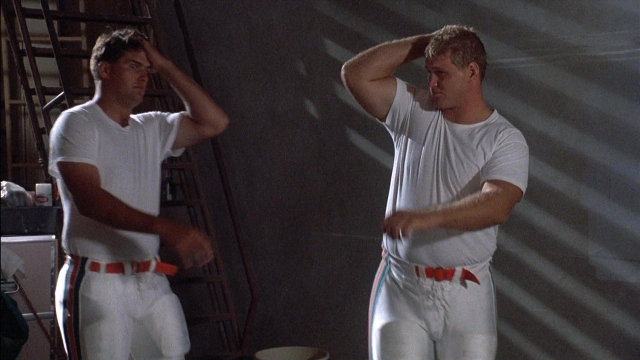Wide shot frame from Ace Ventura: Pet Detective — standing, room, person
