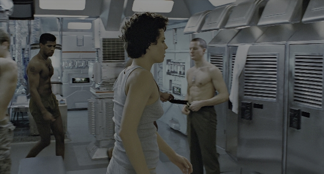 Wide shot frame from Aliens — standing, room, uniform
