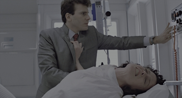 Wide shot frame from Aliens — standing, room, bed