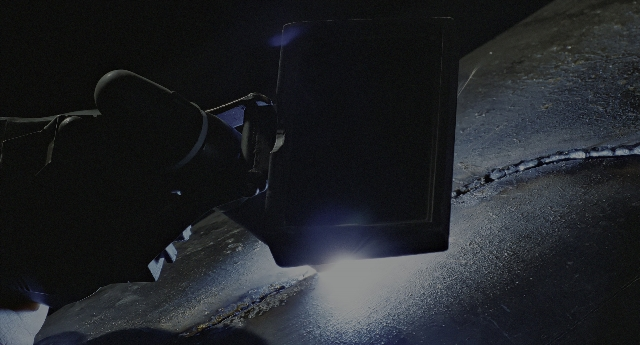 Frame from Aliens — hand, person, footwear