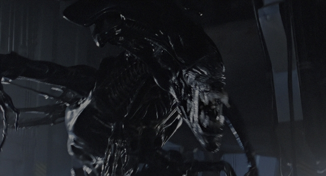 Wide shot frame from Aliens — room, window, statue sculpture