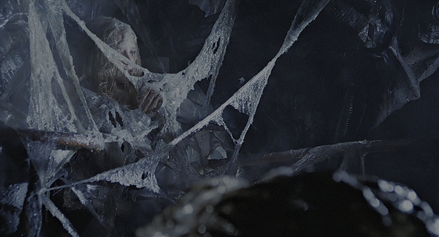 Wide shot frame from Aliens — face, person, human face