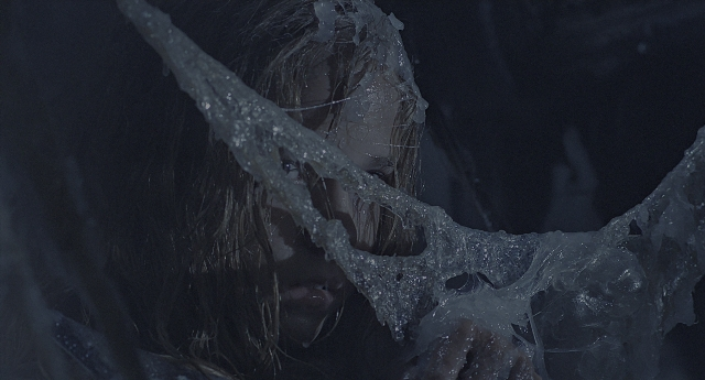 Wide shot frame from Aliens — standing, face, hair