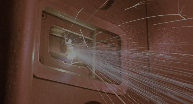 Wide shot frame from Aliens — plate, face, person