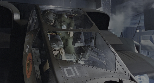 Wide shot frame from Aliens — hat, uniform, car
